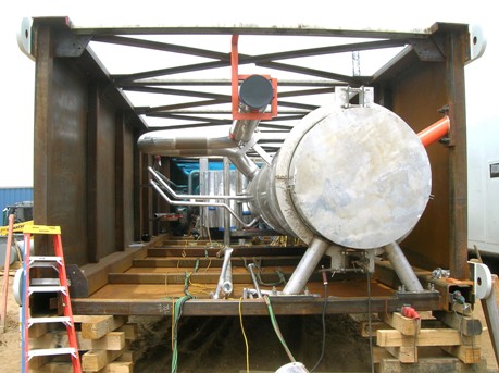End view of cold box module being prepared for erection. Note column, heat exchanger, temporary supports (red).