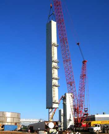 Third ASU cold box module leaves the ground. Note platforms and ladders.